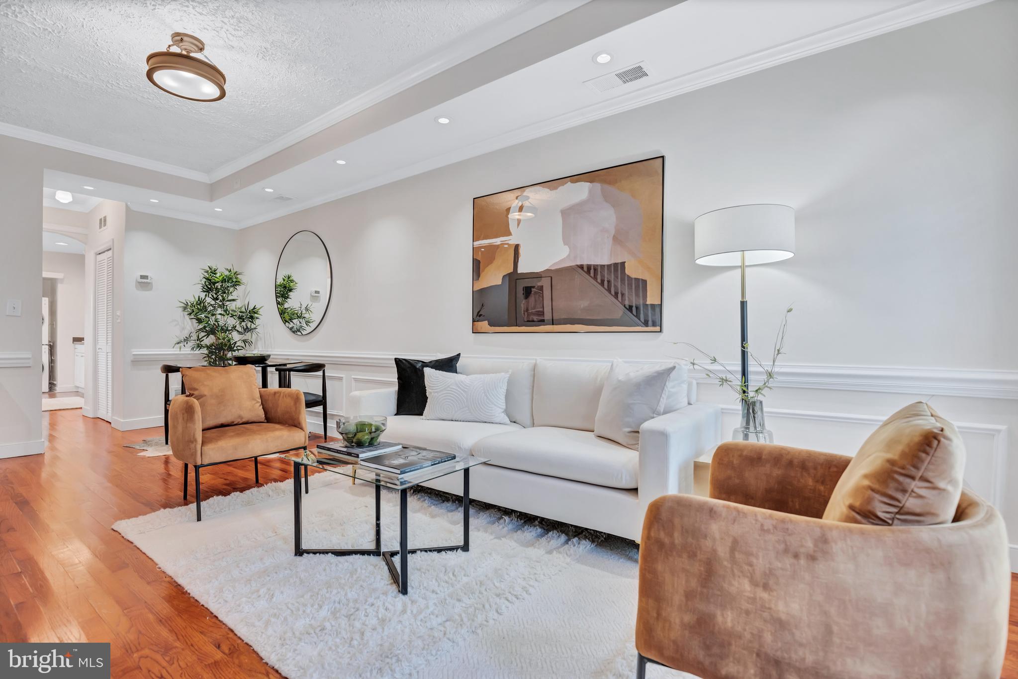 1437 Duke Street Alexandria, VA 22314 - Photo 1 of 45 a living room with furniture and a wooden floor