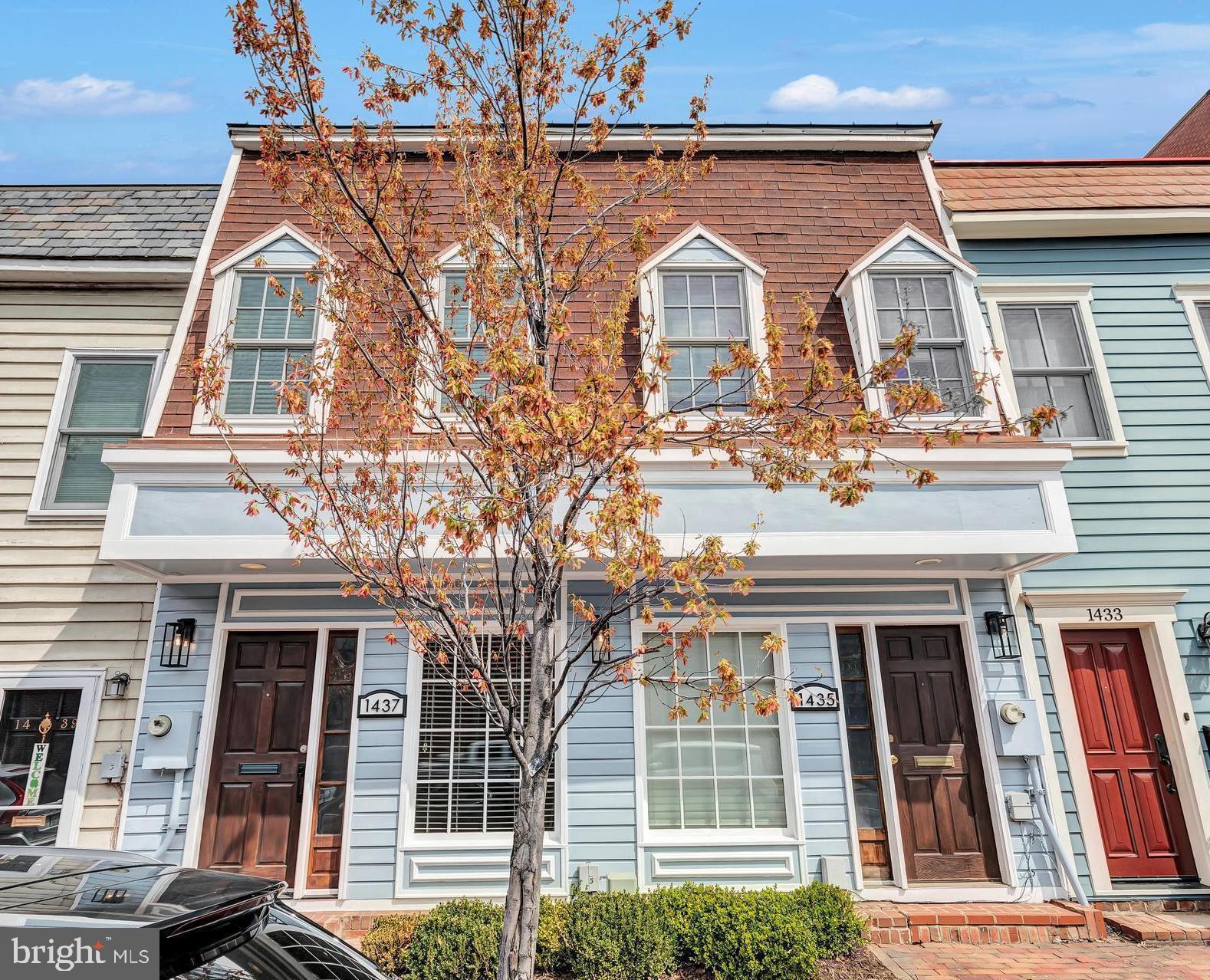 1437 Duke Street Alexandria, VA 22314 - Photo 2 of 45 a view of a brick house with large windows