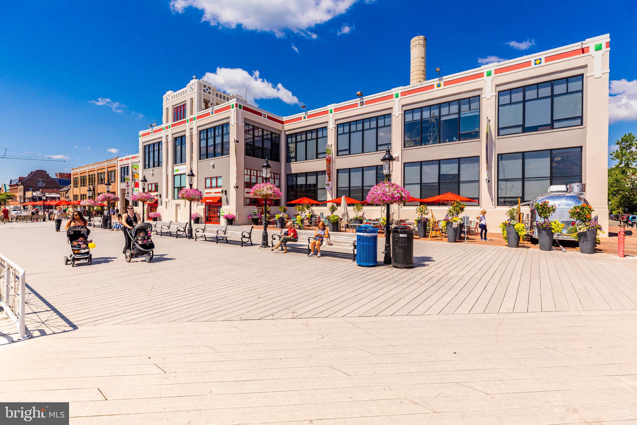 1437 Duke Street Alexandria, VA 22314 - Photo 39 of 45 a front view of a building with parked cars