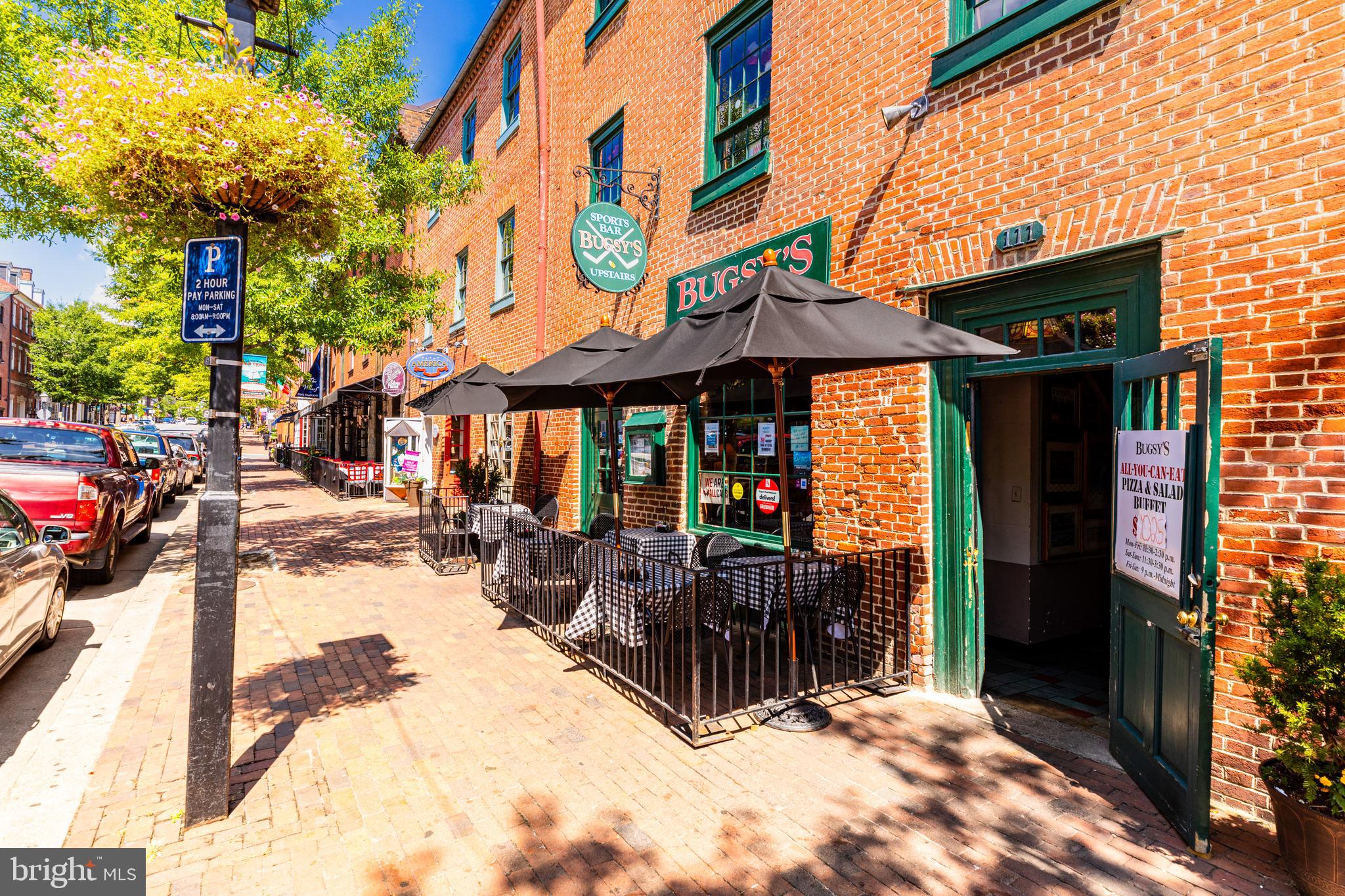 1437 Duke Street Alexandria, VA 22314 - Photo 42 of 45 a view of a chairs and tables in the patio