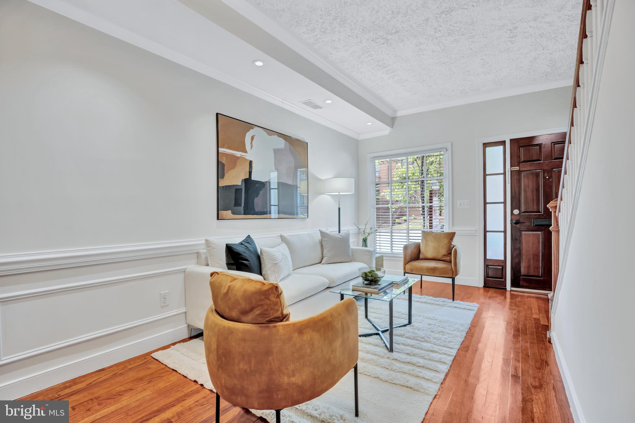 1437 Duke Street Alexandria, VA 22314 - Photo 5 of 45 a living room with furniture and a wooden floor