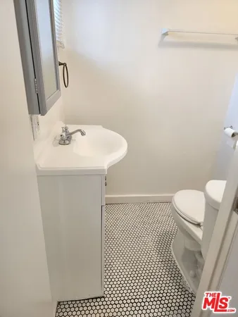 a view of hallway with wooden floor