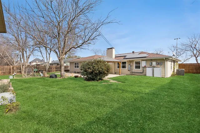 a view of a yard in front of a house