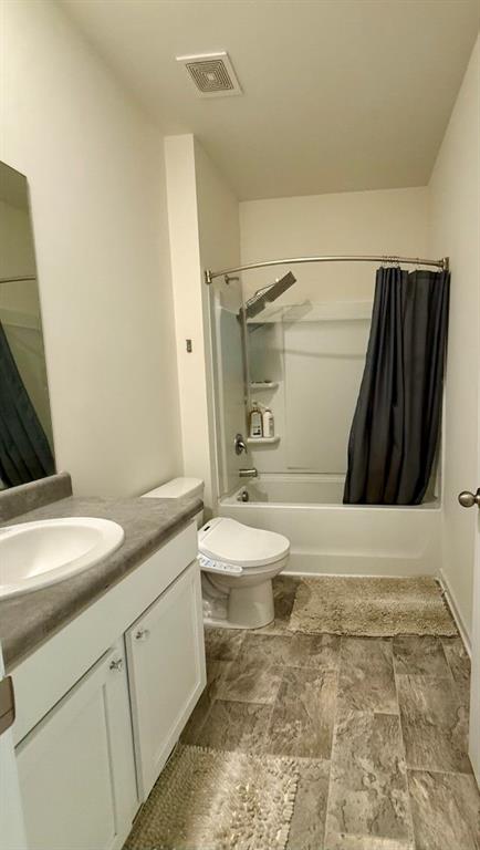 2015 Waycross Lane Dacula, GA 30019 - Photo 12 of 49 a bathroom with a granite countertop sink toilet and shower