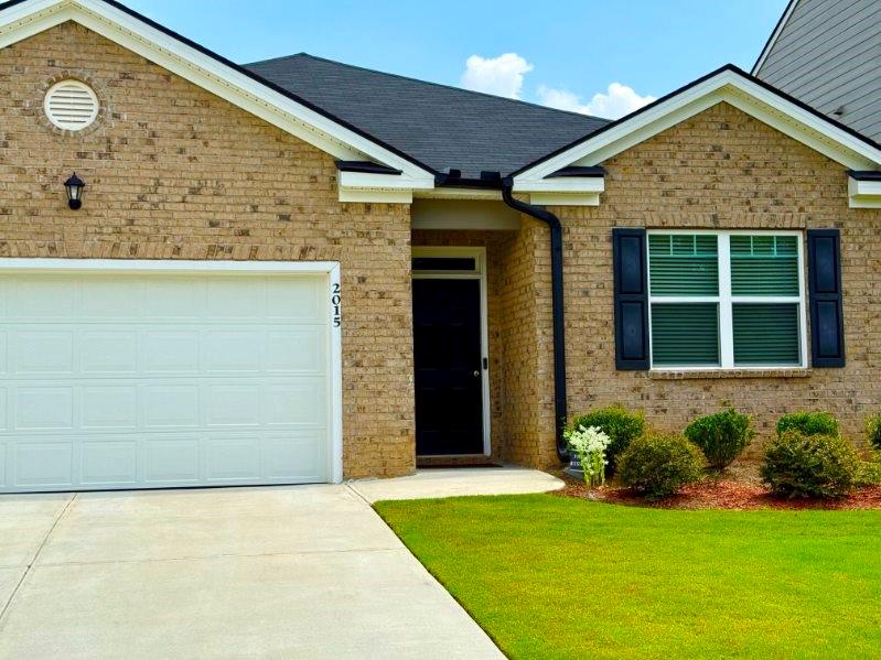 2015 Waycross Lane Dacula, GA 30019 - Photo 2 of 49 a front view of a house with a yard