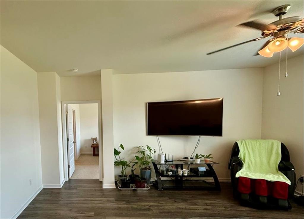 2015 Waycross Lane Dacula, GA 30019 - Photo 24 of 49 a living room with furniture and a flat screen tv