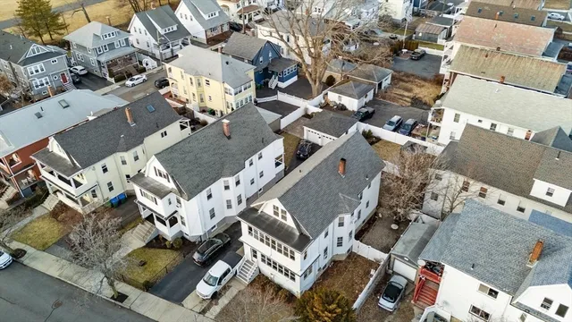 an aerial view of a red and white building
