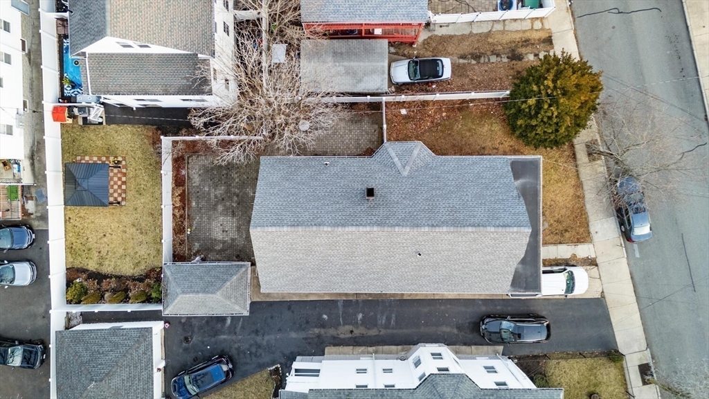 141 4th Street Medford, MA 02155 - Photo 20 of 26 an aerial view of a house with outdoor space