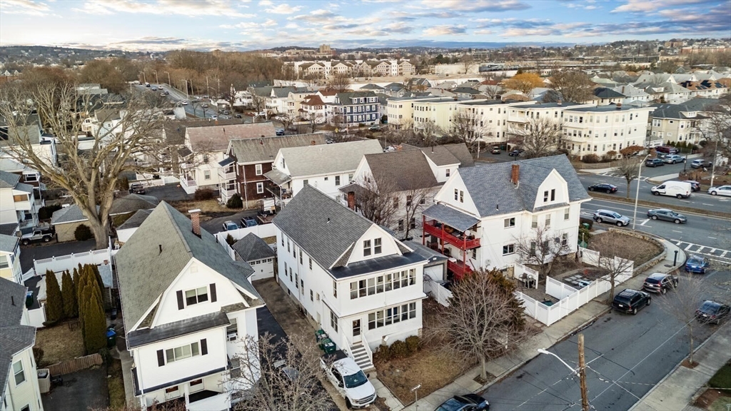 141 4th Street Medford, MA 02155 - Photo 4 of 26 an aerial view of a city with ocean view