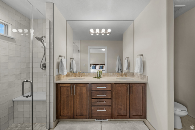 1896 West 800 North Mapleton, UT 84663 - Photo 16 of 55 Bathroom featuring a shower stall and double vanity