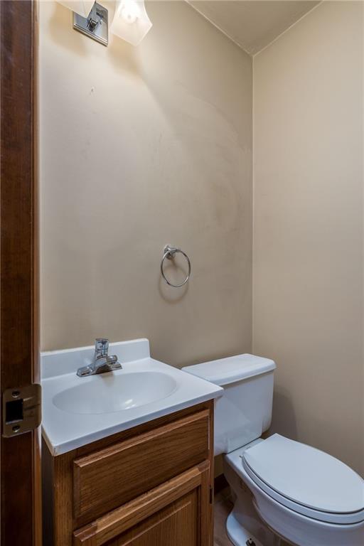 17 Cranberry Lane Cecil, PA 15321 - Photo 12 of 25 a bathroom with a sink mirror vanity and toilet