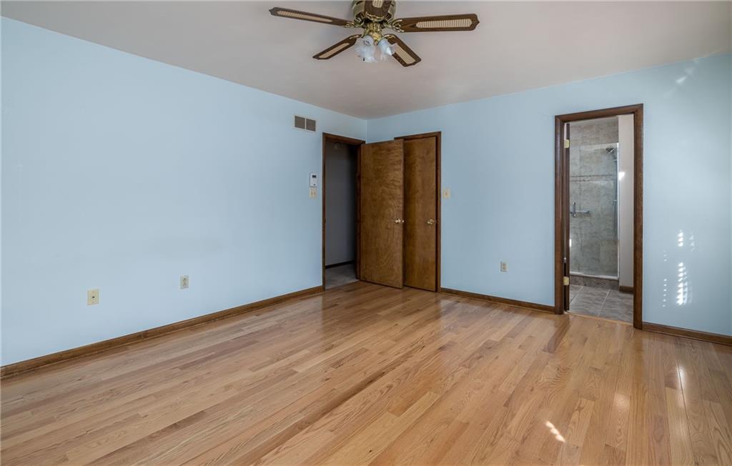 17 Cranberry Lane Cecil, PA 15321 - Photo 13 of 25 a view of an empty room with wooden floor