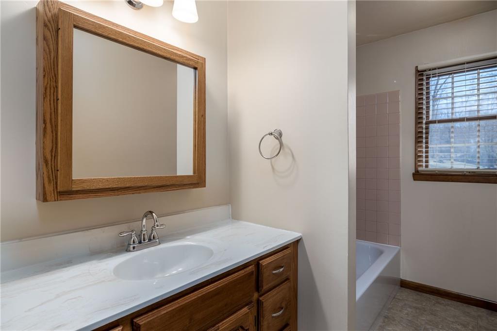 17 Cranberry Lane Cecil, PA 15321 - Photo 17 of 25 a bathroom with a sink and a mirror