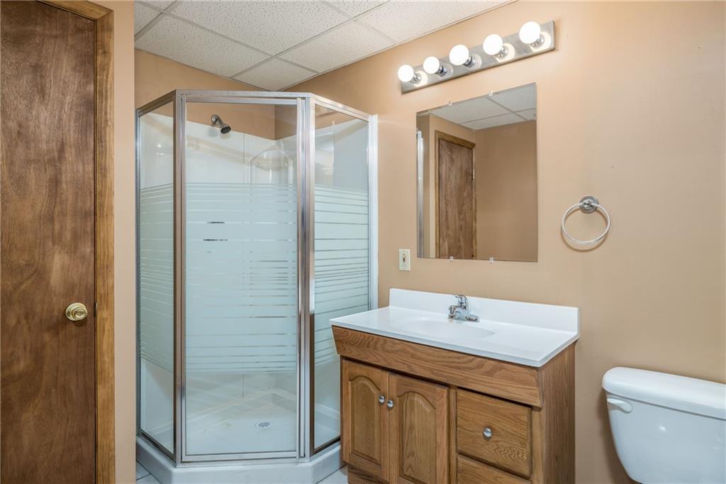 17 Cranberry Lane Cecil, PA 15321 - Photo 21 of 25 a bathroom with a toilet a sink and mirror