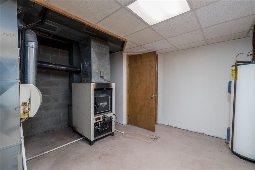 17 Cranberry Lane Cecil, PA 15321 - Photo 22 of 25 a view of an empty room with a fireplace
