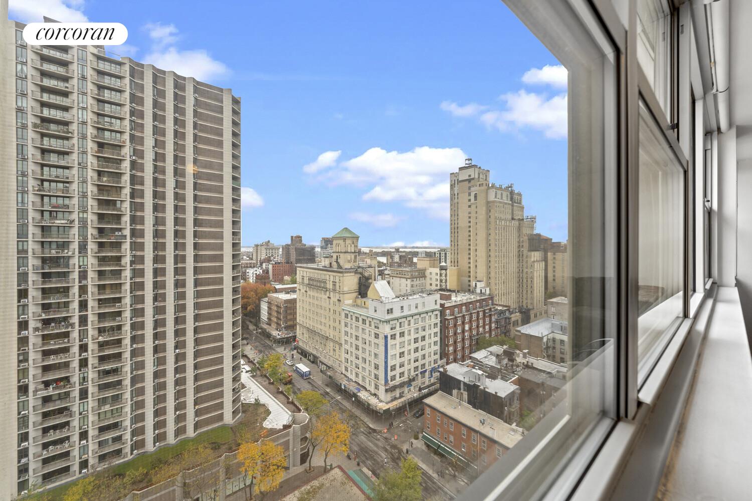 75 Henry Street, Unit 18J Brooklyn, NY 11201 - Photo 11 of 13 a view of balcony with a floor to ceiling window next to a city view