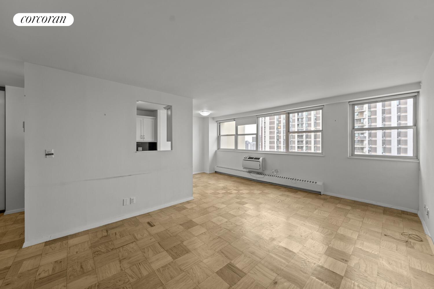 75 Henry Street, Unit 18J Brooklyn, NY 11201 - Photo 2 of 13 a view of an empty room with a window