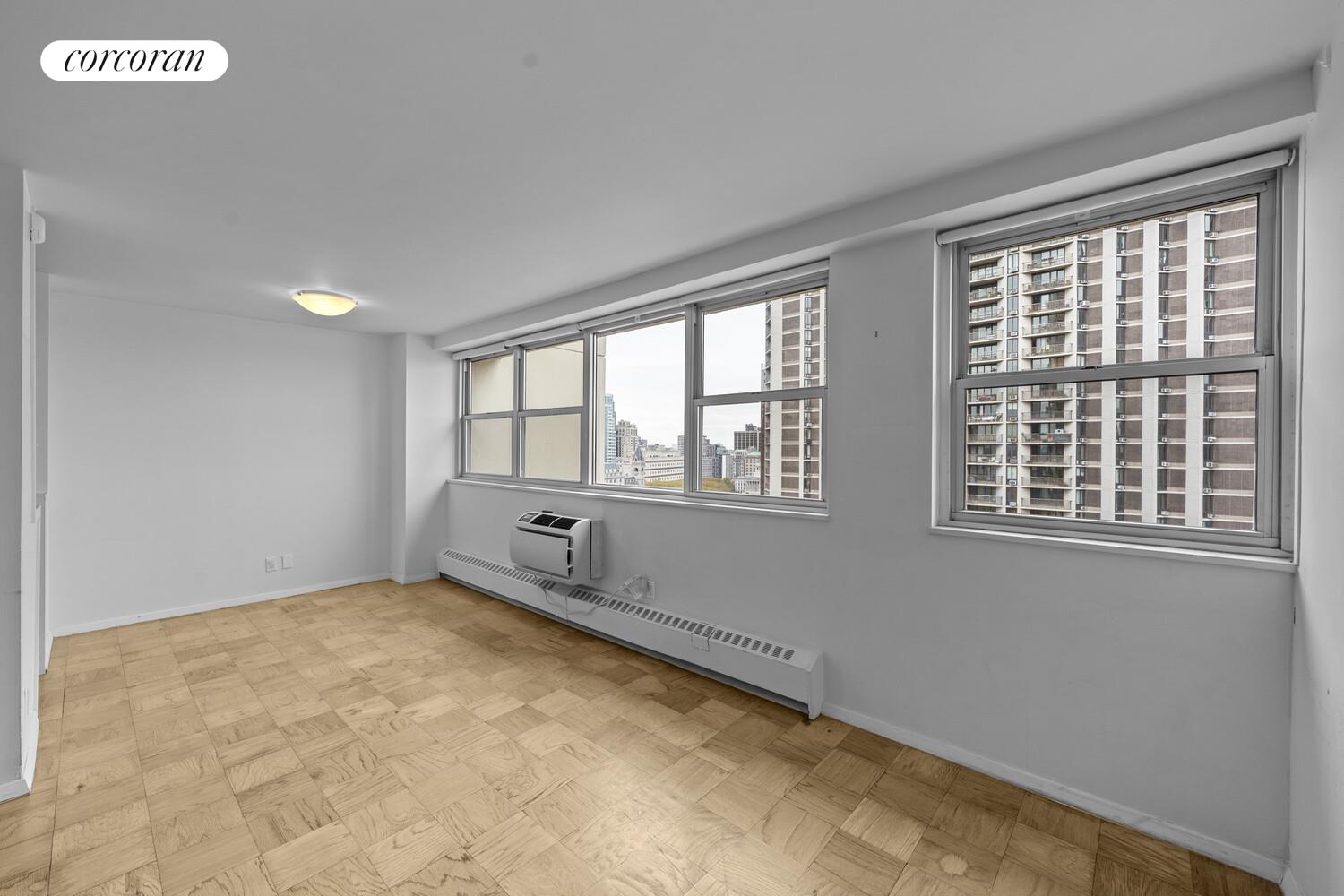 75 Henry Street, Unit 18J Brooklyn, NY 11201 - Photo 4 of 13 a view of an empty room with a window