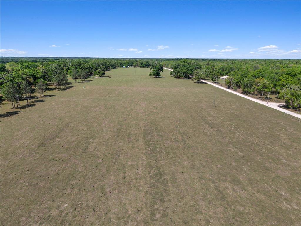4639 Southwest Wilson Springs Road Fort White, FL 32038 - Photo 40 of 76 a view of a field with an ocean