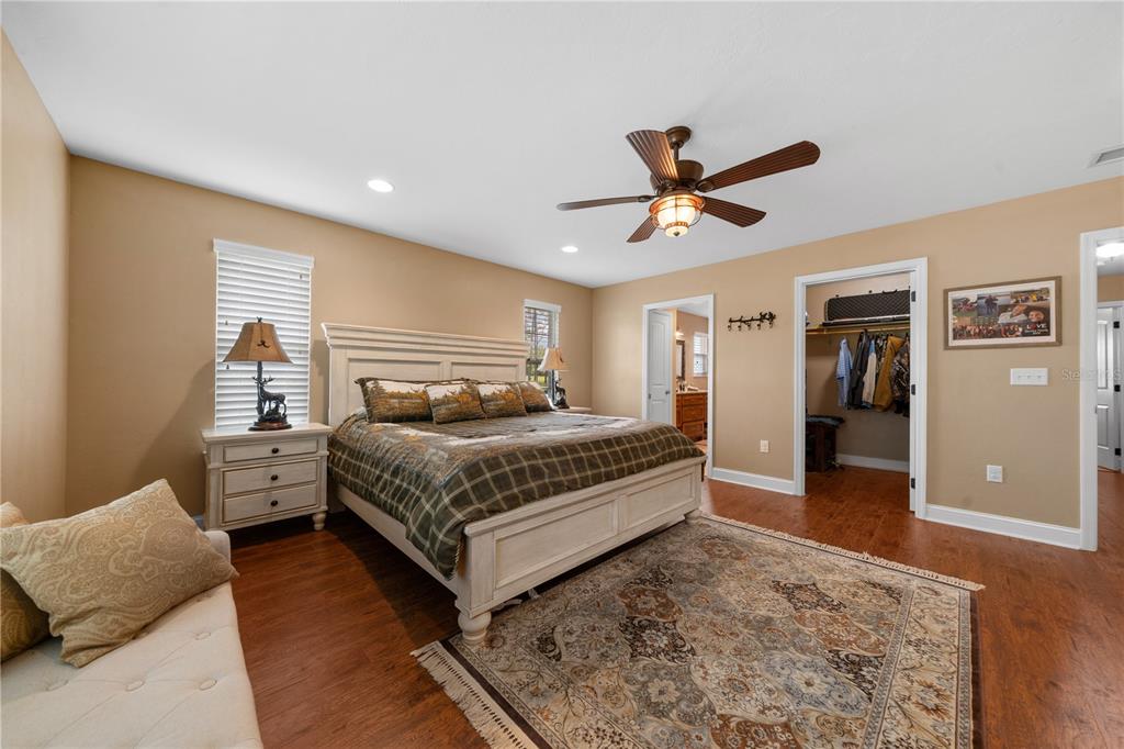 4639 Southwest Wilson Springs Road Fort White, FL 32038 - Photo 5 of 76 a bedroom with a bed and a couch