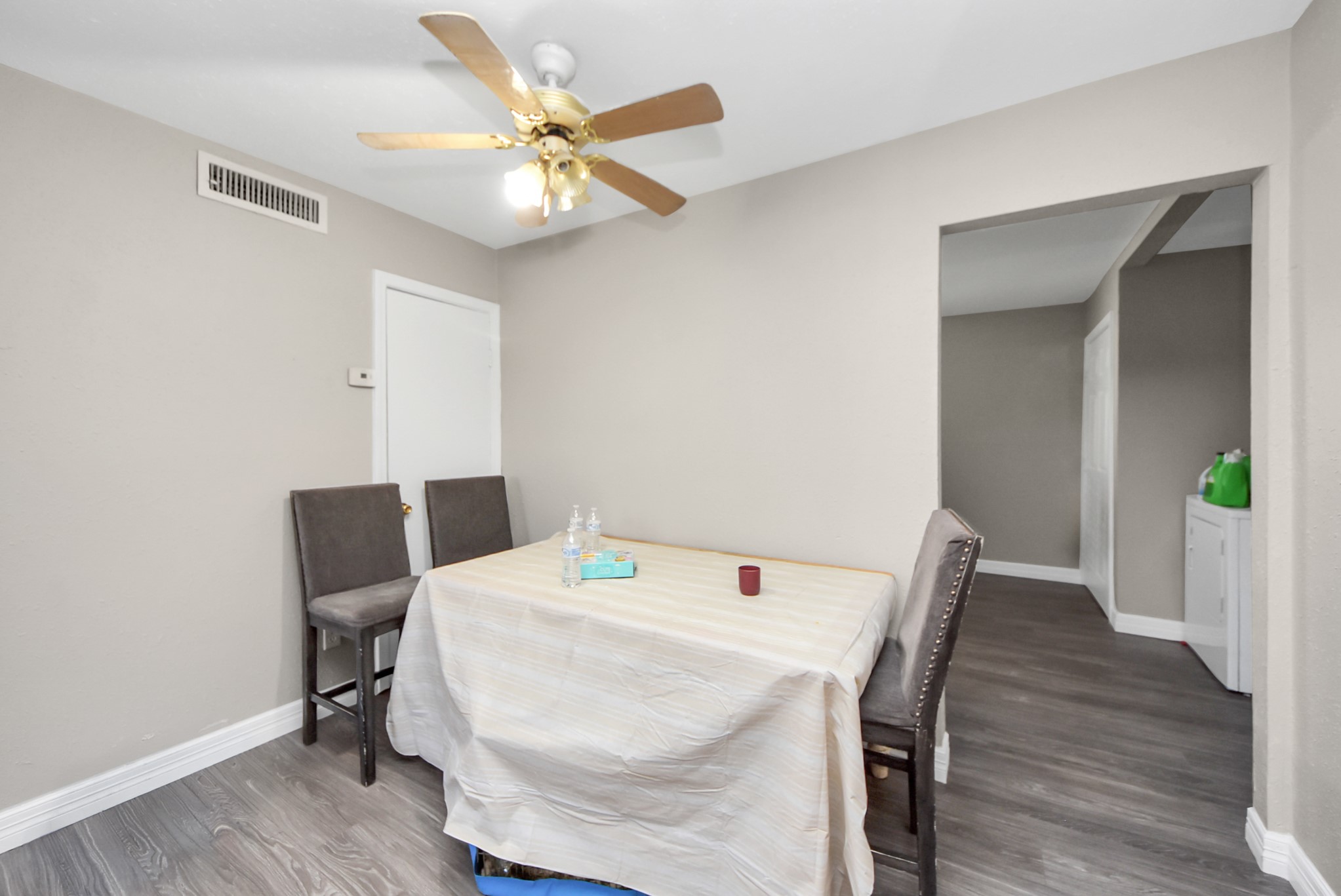 817 Church Street Crosby, TX 77532 - Photo 11 of 18 a view of a dining room with furniture and wooden floor