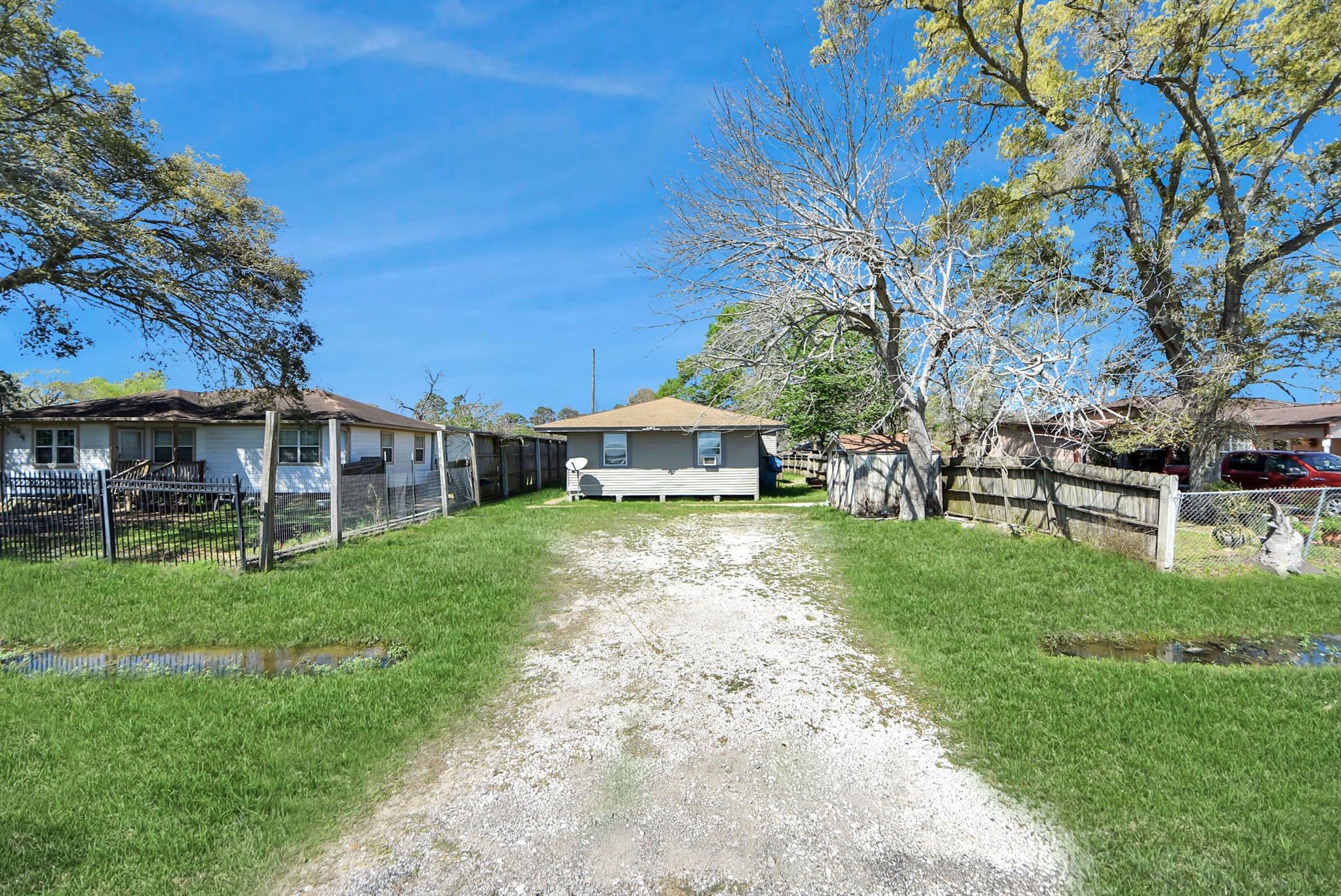 817 Church Street Crosby, TX 77532 - Photo 17 of 18 a view of a house with backyard and sitting area