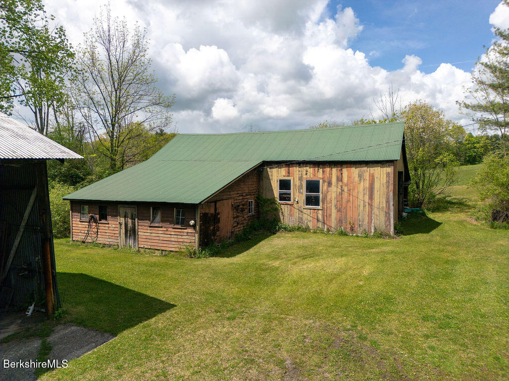 45 Swamp Road West Stockbridge, MA 01266 - Photo 51 of 52 a house view with a garden space