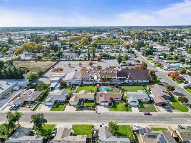 an aerial view of a city with lots of residential buildings