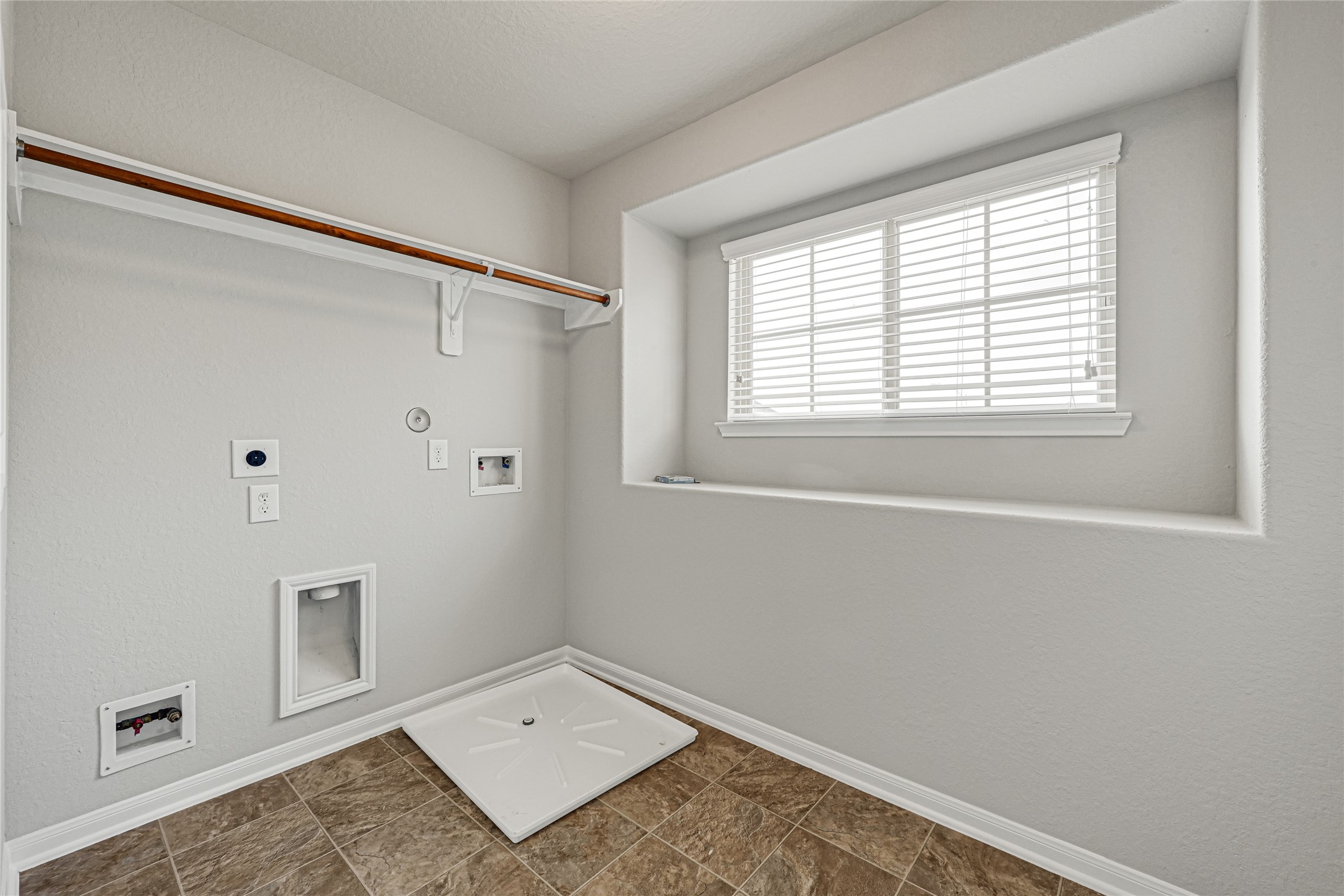 5331 Seabird Street Baytown, TX 77521 - Photo 27 of 38 a view of an empty room with a window