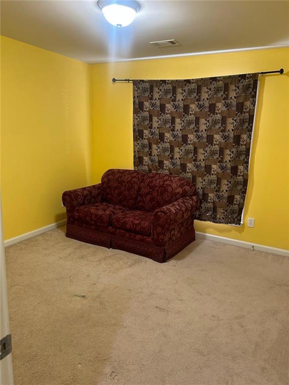 815 Earlham Drive Suwanee, GA 30024 - Photo 17 of 30 a living room with a couch