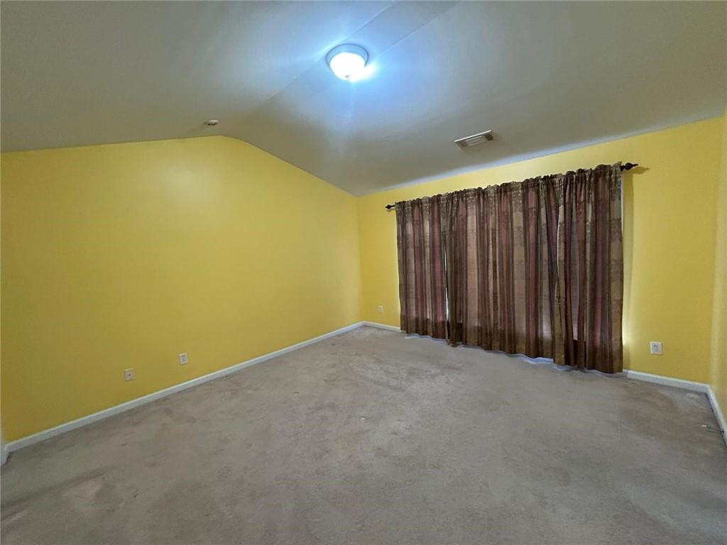 815 Earlham Drive Suwanee, GA 30024 - Photo 19 of 30 a view of an empty room