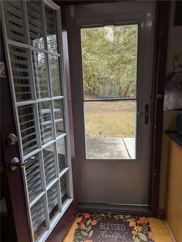 a view of walk in closet with window