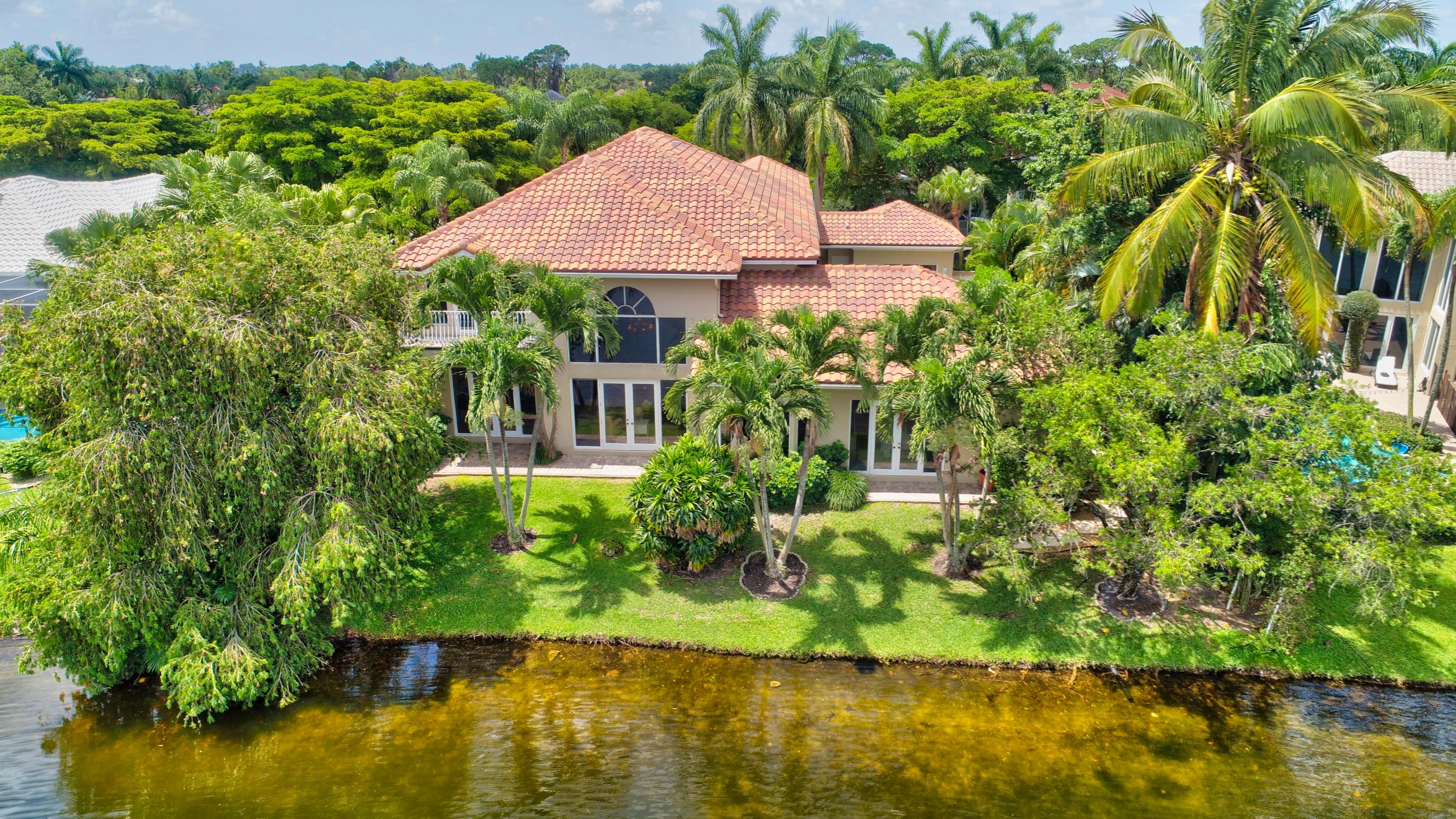 3221 Northwest 61st Street Boca Raton, FL 33496 - Photo 2 of 34 11_dji_0641and4more
