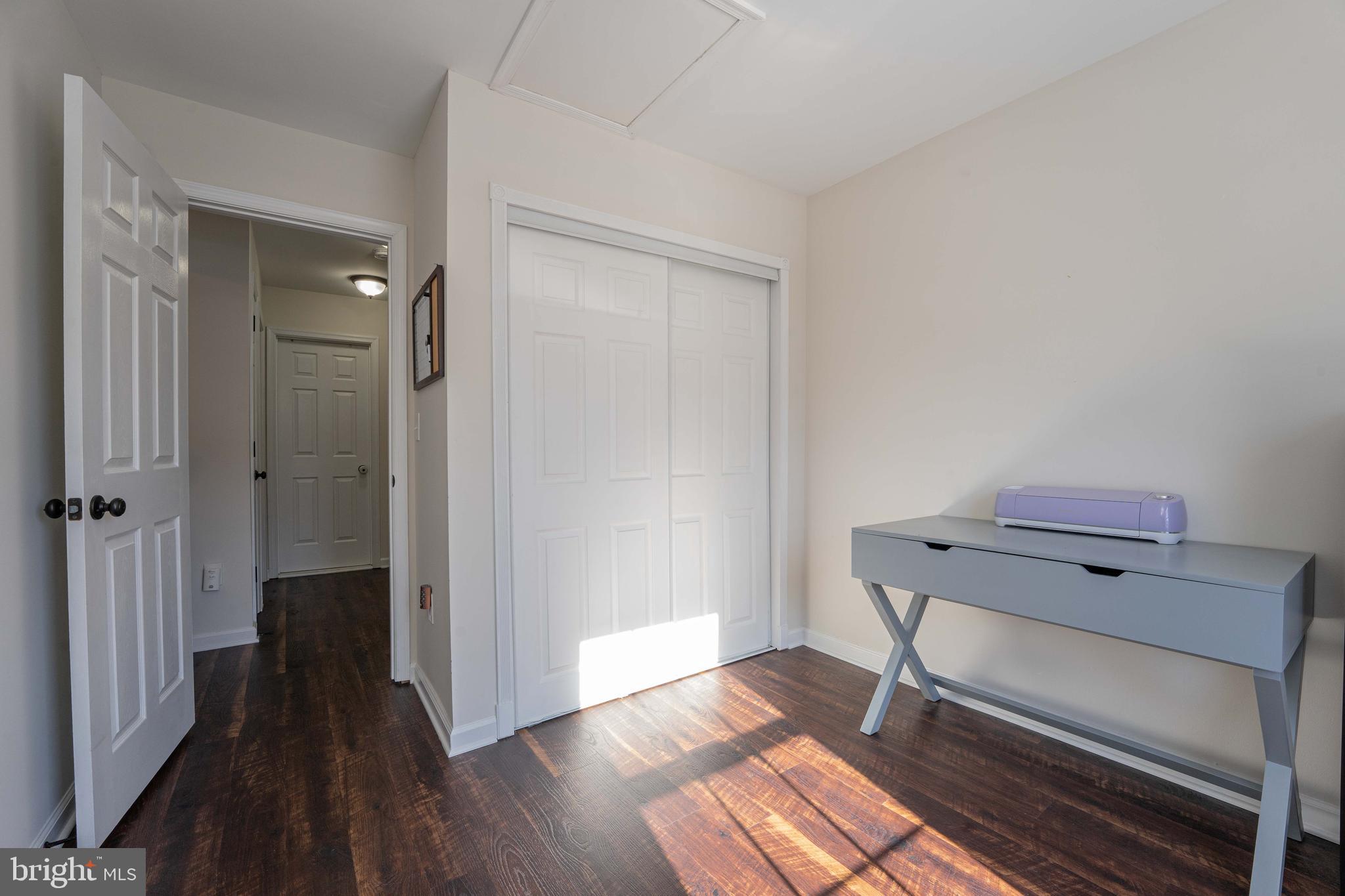 2170 Sewanee Drive Forest Hill, MD 21050 - Photo 18 of 34 a room that has a bench and wooden floor