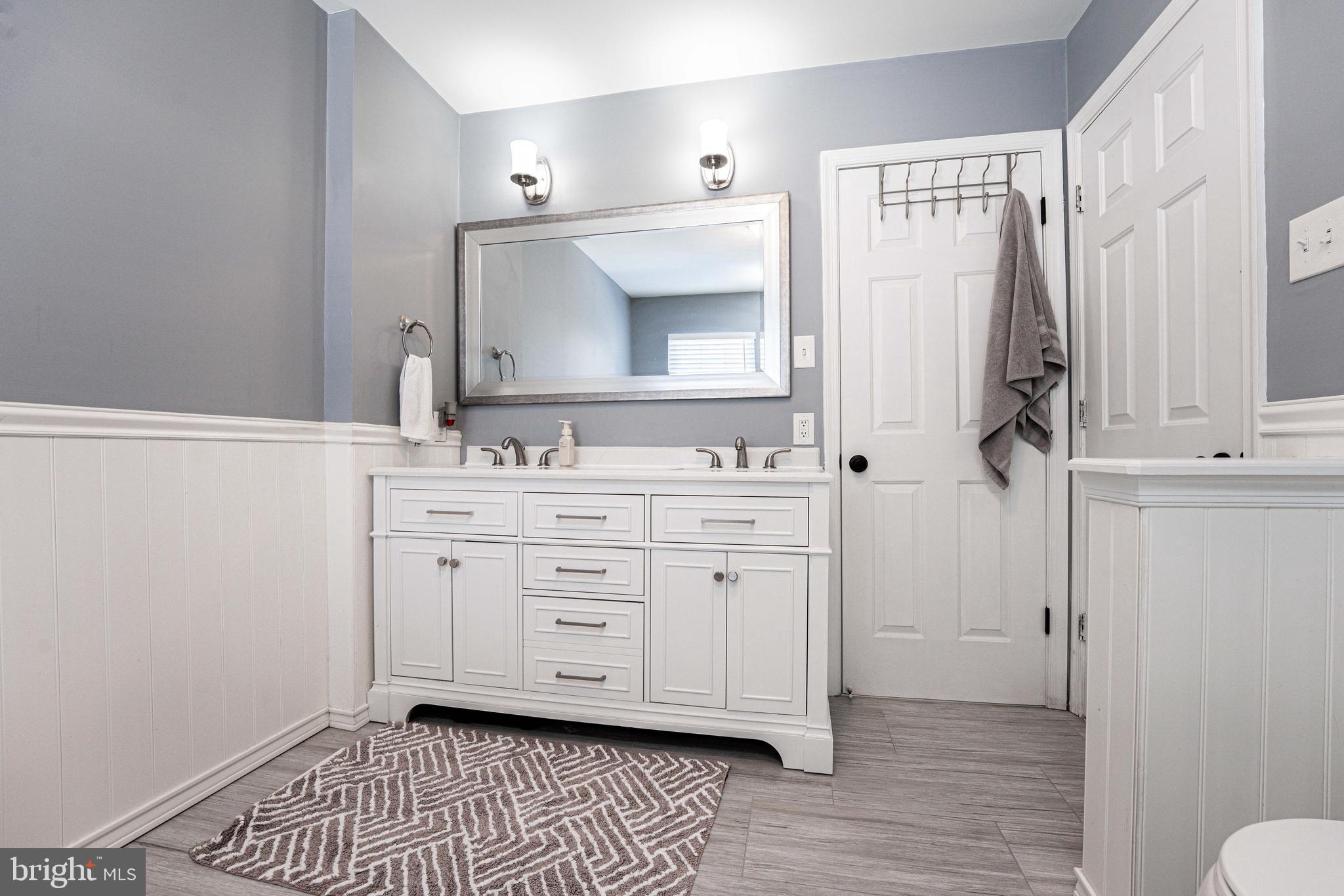 2170 Sewanee Drive Forest Hill, MD 21050 - Photo 26 of 34 a bathroom with a sink a mirror and a shower