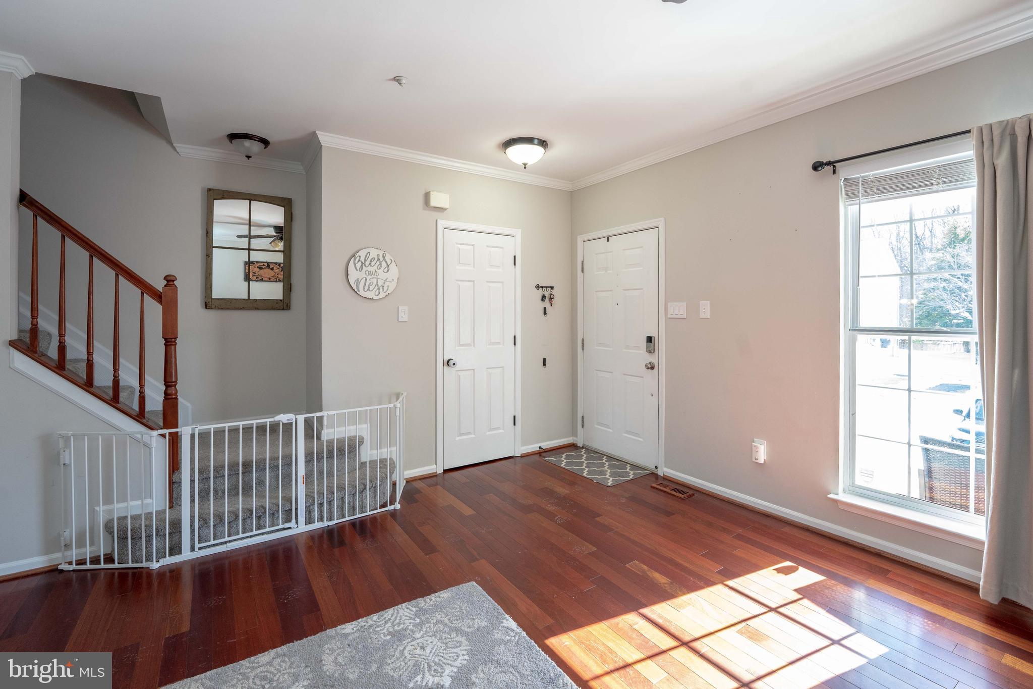 2170 Sewanee Drive Forest Hill, MD 21050 - Photo 6 of 34 a view of a hallway with wooden floor and windows