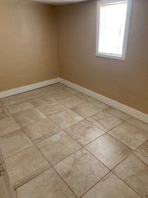 3014 Duke Street Lubbock, TX 79415 - Photo 6 of 10 a view of a room that has a window in it