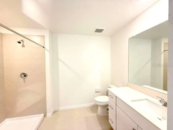 a bathroom with a sink and a bathtub