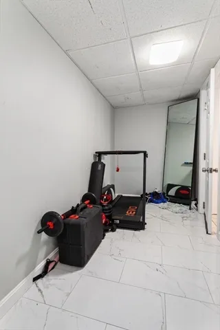 a bathroom with a bath tub with a shower