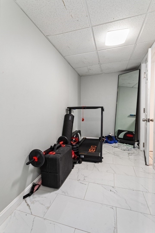 14 Bay Road Revere, MA 02151 - Photo 16 of 38 a bedroom with a bed and a closet