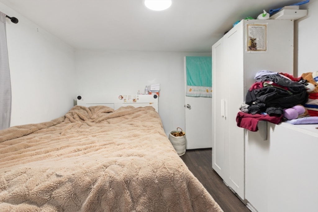 14 Bay Road Revere, MA 02151 - Photo 30 of 38 a bed room with a bed