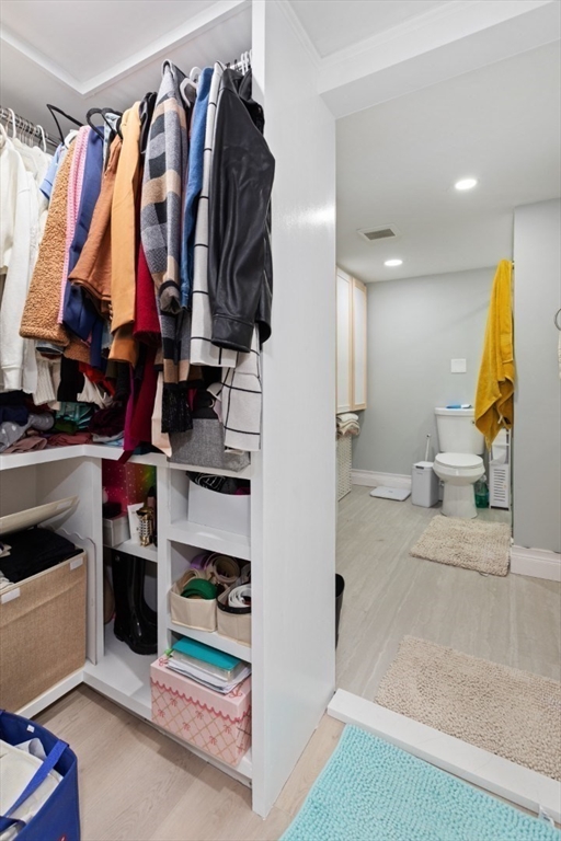 14 Bay Road Revere, MA 02151 - Photo 9 of 38 a view of walk in closet with clothes and shoes