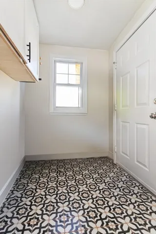 a bathroom with a toilet and shower