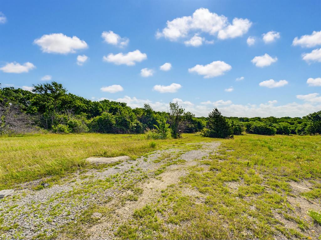 1300 South Trenchard Street Decatur, TX 76234 - Photo 34 of 40 a view of an ocean and a yard