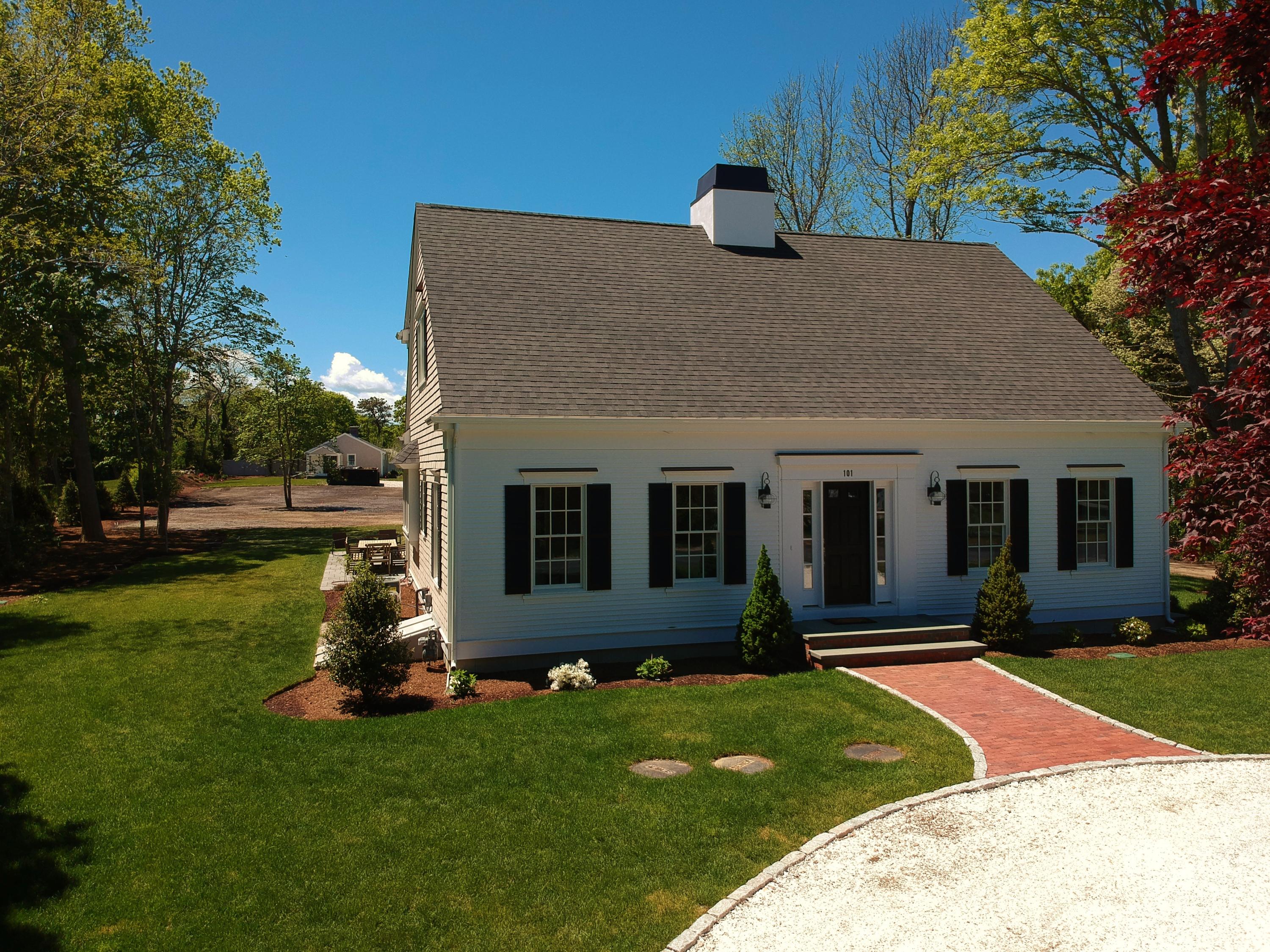 101 Gibson Road Orleans, MA 02653 - Photo 54 of 65 a view of a house with a yard