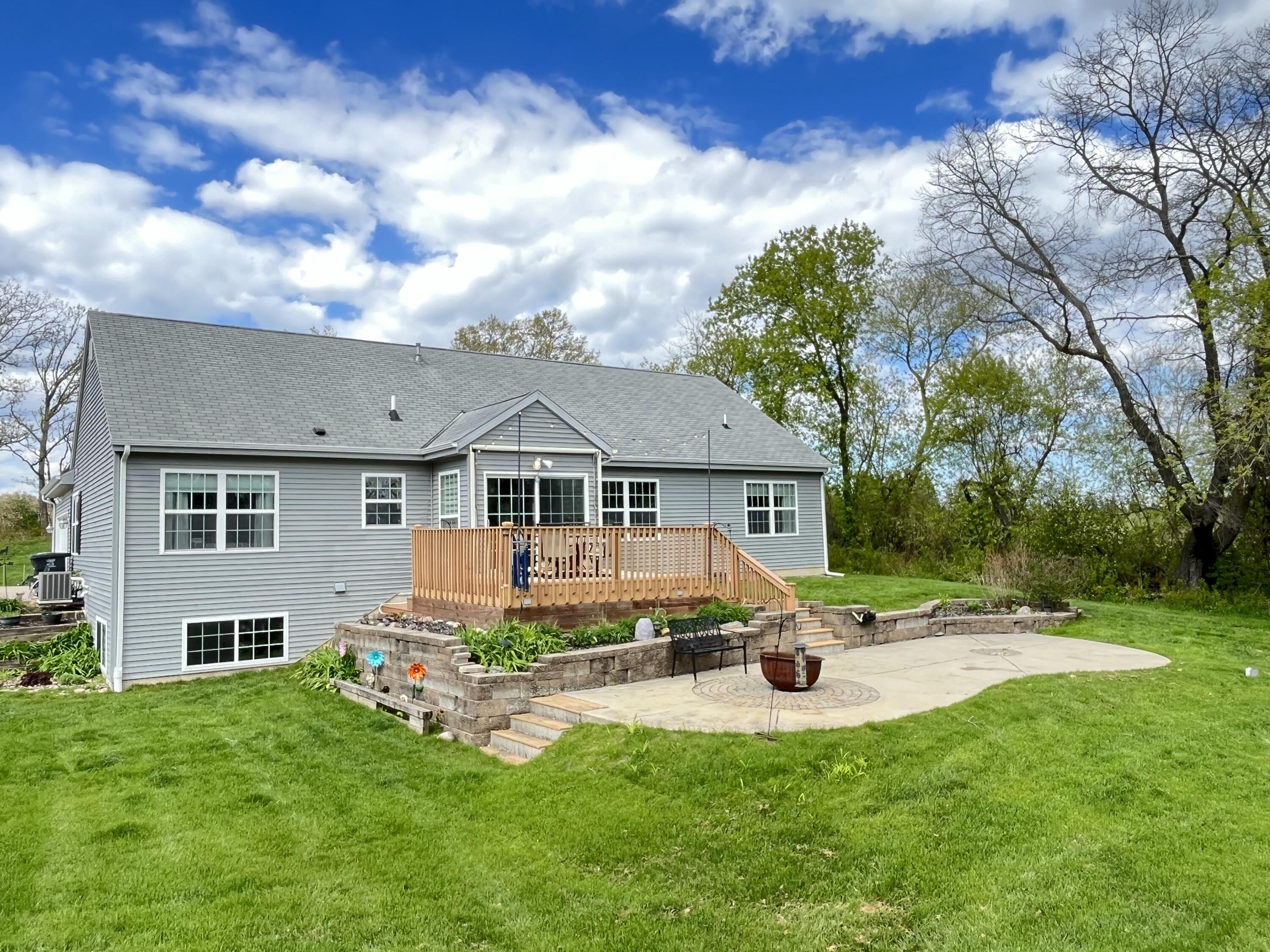 10155 West Oakwood Road Franklin, WI 53132 - Photo 29 of 40 Stairs to Patio