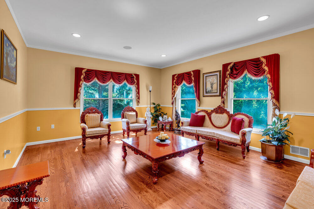 1721 Azure Drive Neptune, NJ 07753 - Photo 25 of 95 a living room with furniture a rug and a large window