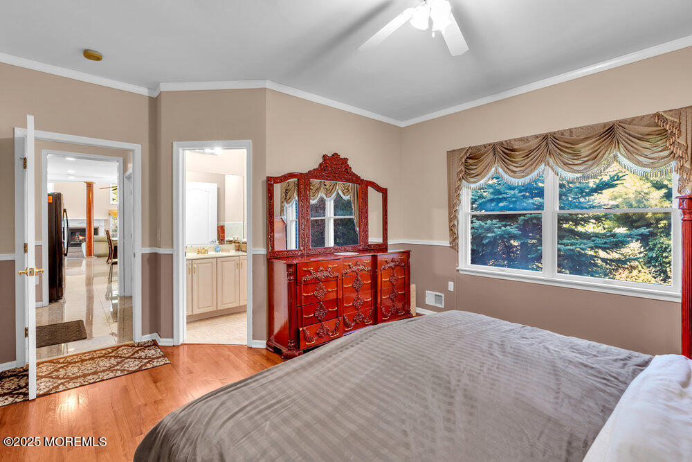 1721 Azure Drive Neptune, NJ 07753 - Photo 48 of 95 a bedroom with a bed and a large window