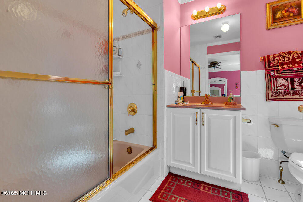 1721 Azure Drive Neptune, NJ 07753 - Photo 56 of 95 a bathroom with a sink and a shower