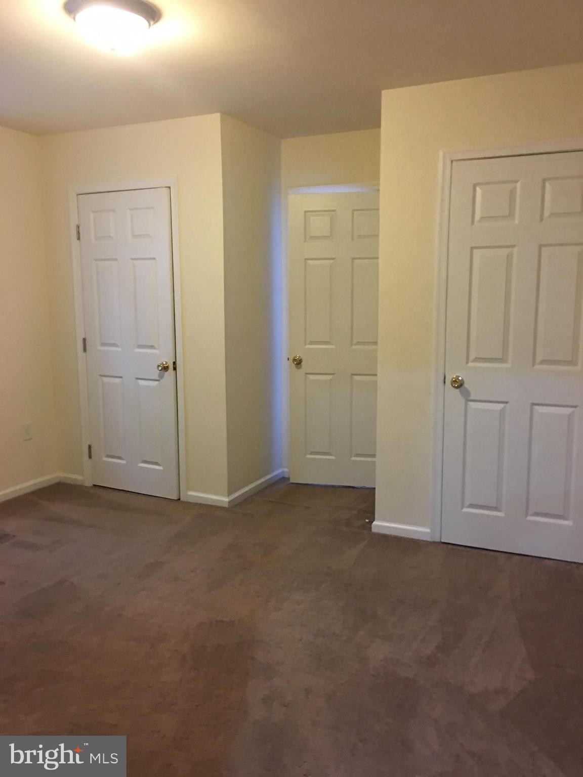 25 Zane Street, Unit A Glassboro, NJ 08028 - Photo 15 of 16 an empty room with closet area